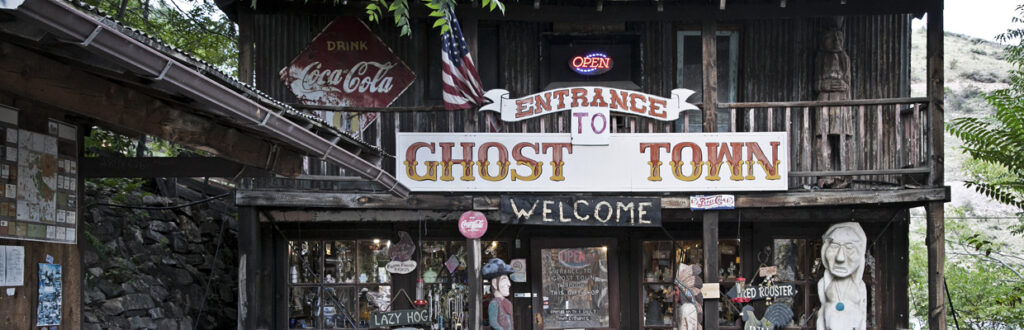 the gold king mine ghost town sign on the gift shop