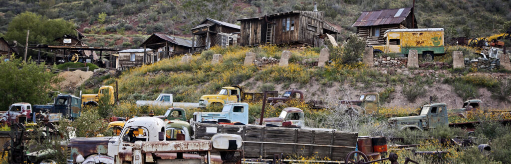 some trucks and old buildings at the gold king mine